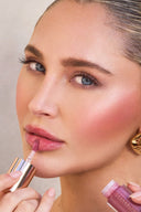 YB Cosmetics Lip Oil on model in Wild Rose