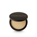 Pressed mineral rice powder compact in tan-beige shade, black lid and pan
