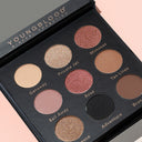 Closed makeup palette with multiple pressed shimmer eyeshadow shades in nude and rose