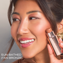 Pro Sculpt® Crème Contour Stick on cheek, in tan bronze shade
