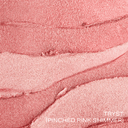 Tryst pinched pink shimmer swatch close-up on skin