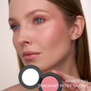Pressed mineral blush compact with rosy pink shimmer and a radiant cheek glow