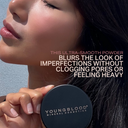 Mineral loose foundation worn on face with compact held near cheek