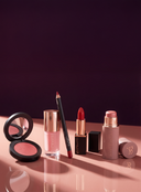 Collection of red and pink Youngblood Cosmetics